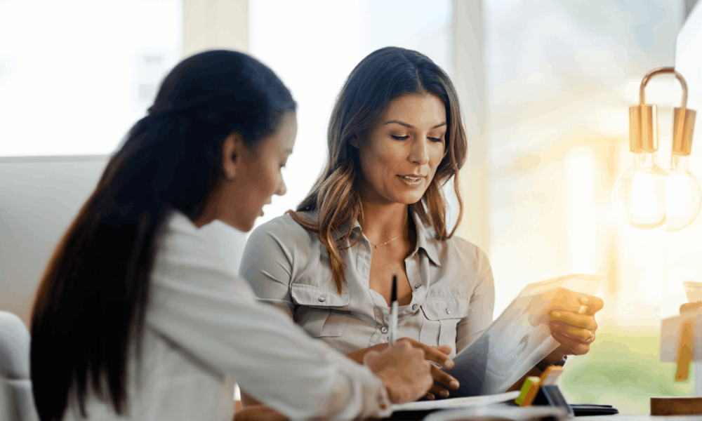 business-women-file-talking-partnership-planning-paperwork-office-together-woman-teamwork-focus-with-documents-notes-schedule-job-collaboration-consulting-advice (1) (1)